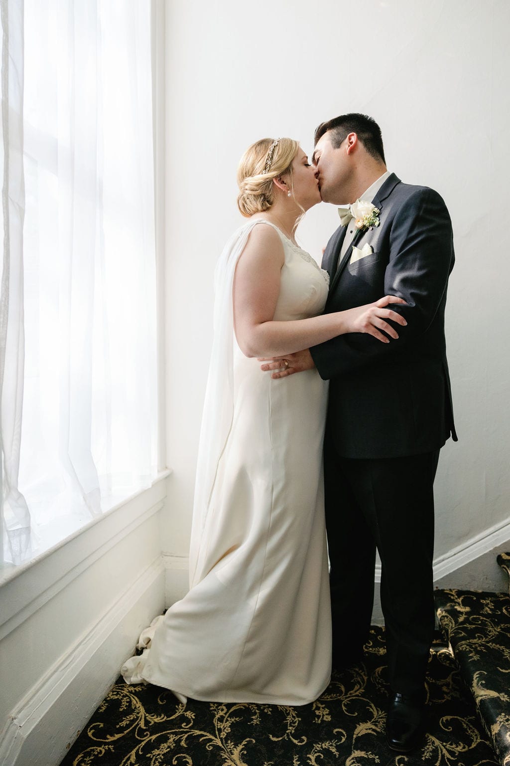 The couple together just after the ceremony, a garden wedding at Eldredge Manor in Utah