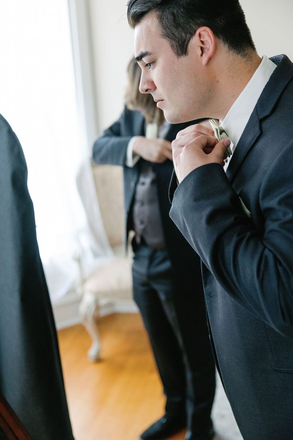 Grace and Miles wedding at Eldredge Manor, the groom getting ready