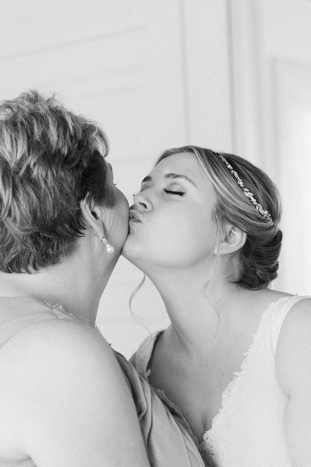 Grace and Miles wedding at Eldredge Manor, a quiet moment with a bridesmaid, black and white