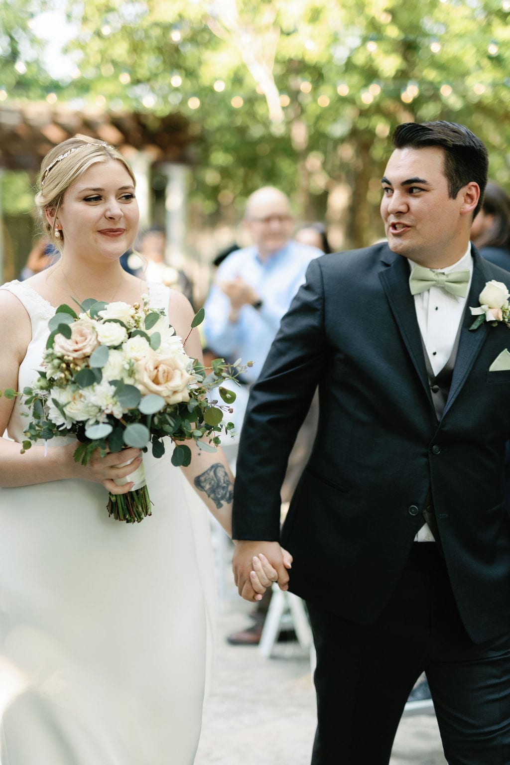 Grace and Miles wedding at Eldredge Manor, just married, the recessional