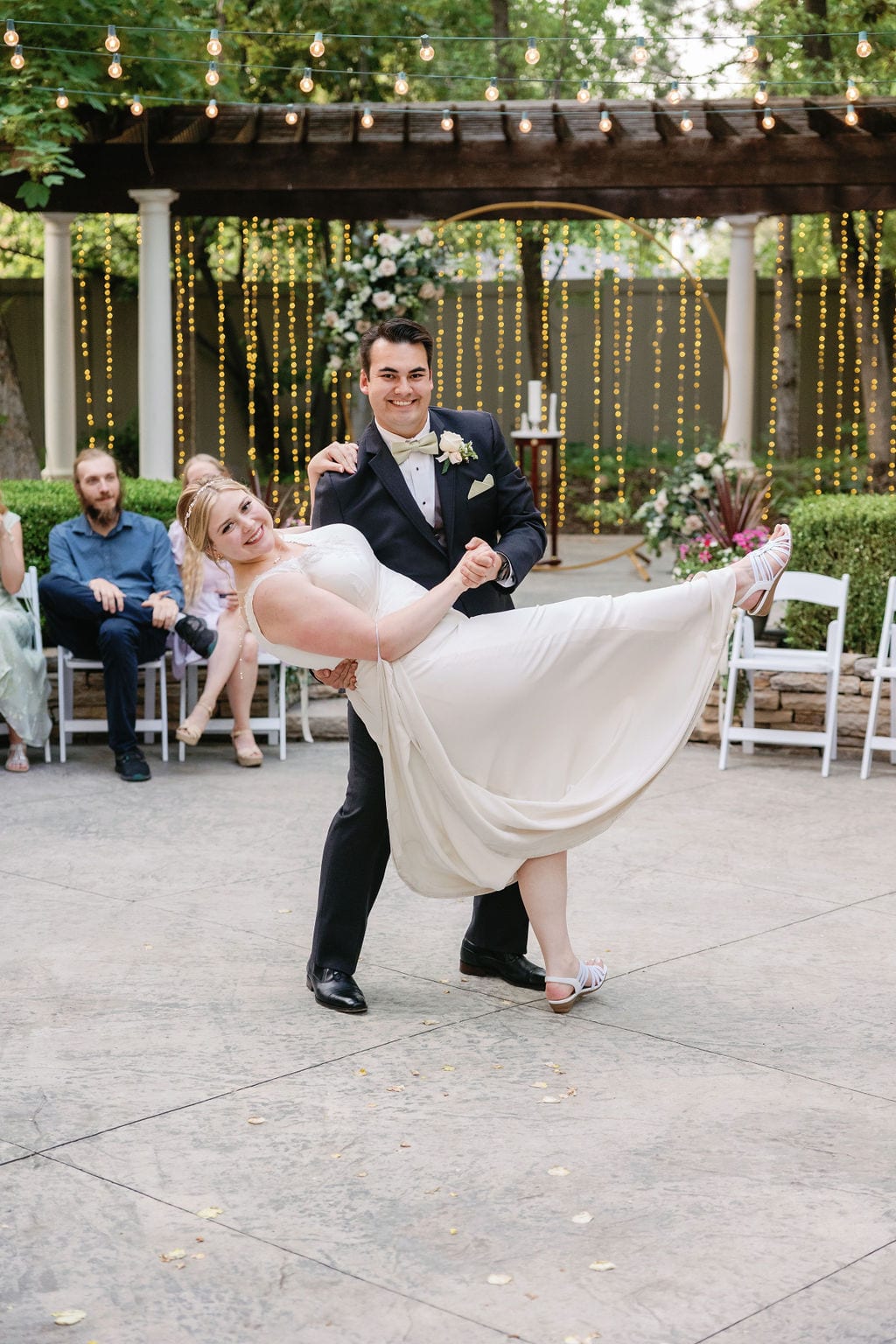 Grace and Miles wedding at Eldredge Manor, a spin under the string lights