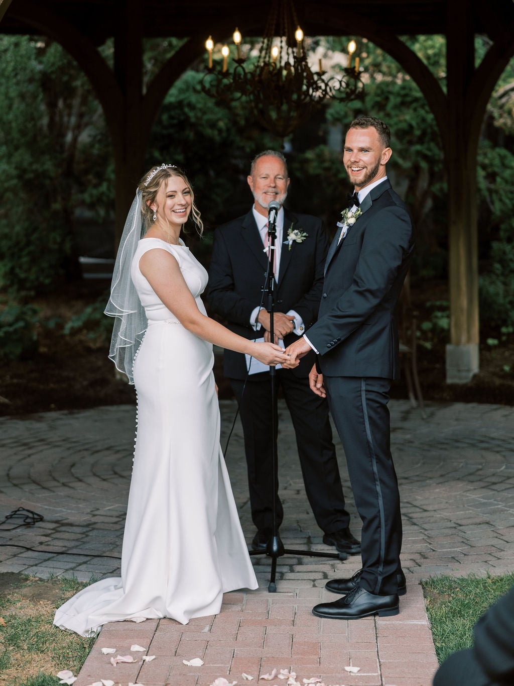 Joe and Holly wedding, exchanging vows under the gazebo at Thanksgiving Point