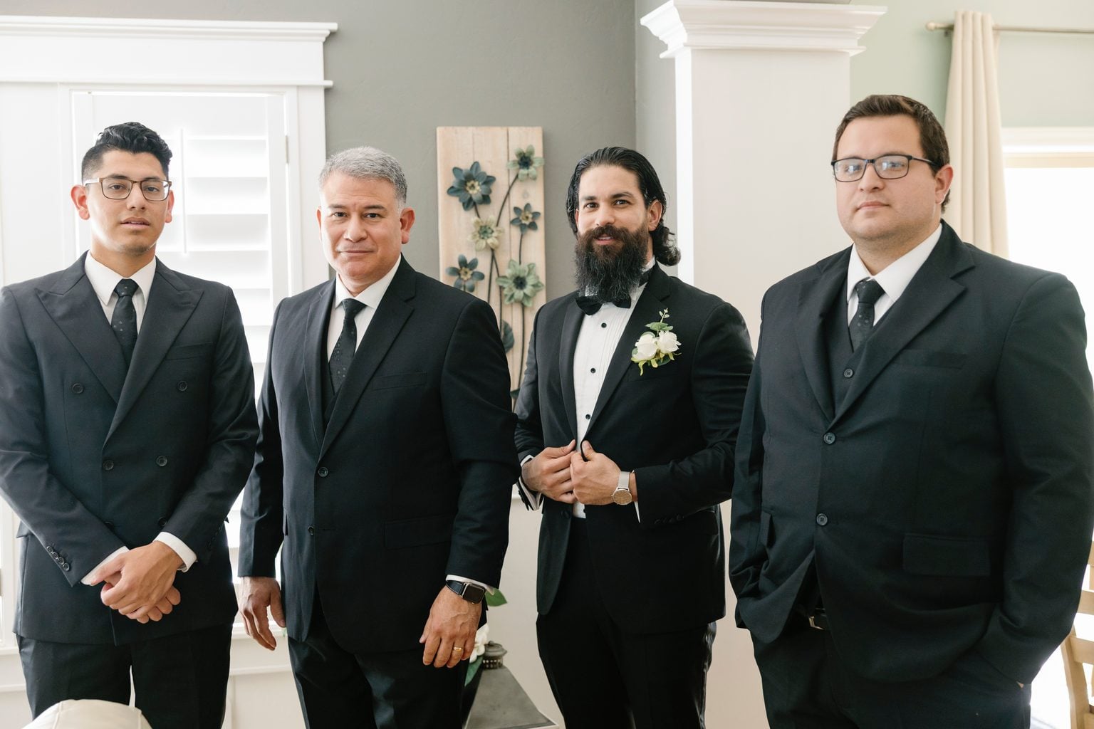 Saint with his groomsmen in black tuxedos before the ceremony, a black-tie Utah wedding