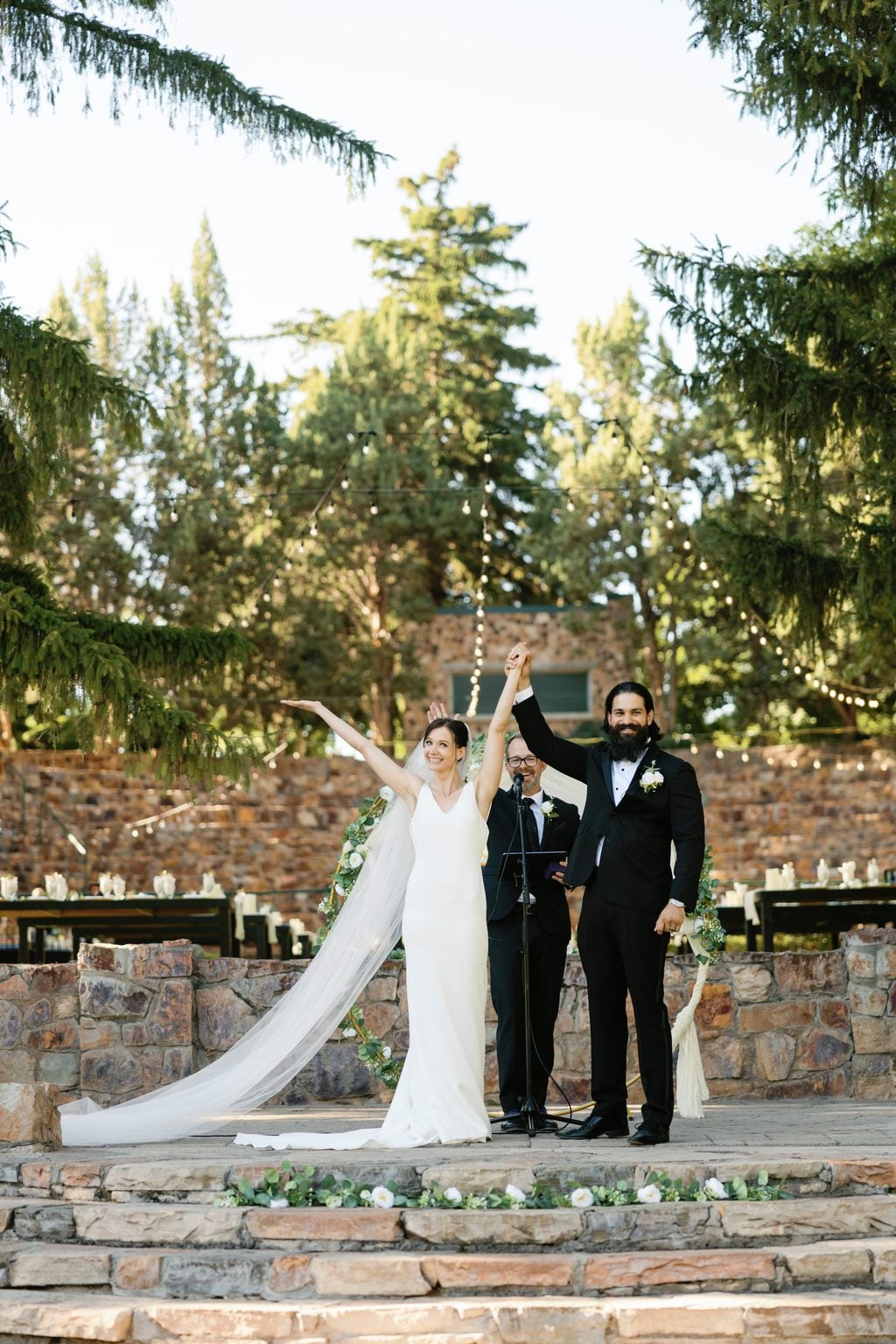 A family portrait with the newlyweds at the garden estate