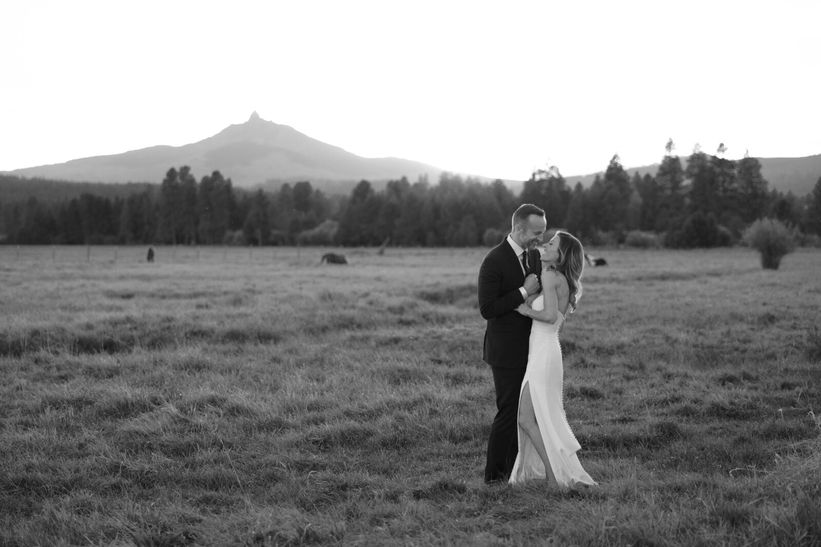 Gina and Ford in a Utah meadow on their wedding day, black and white