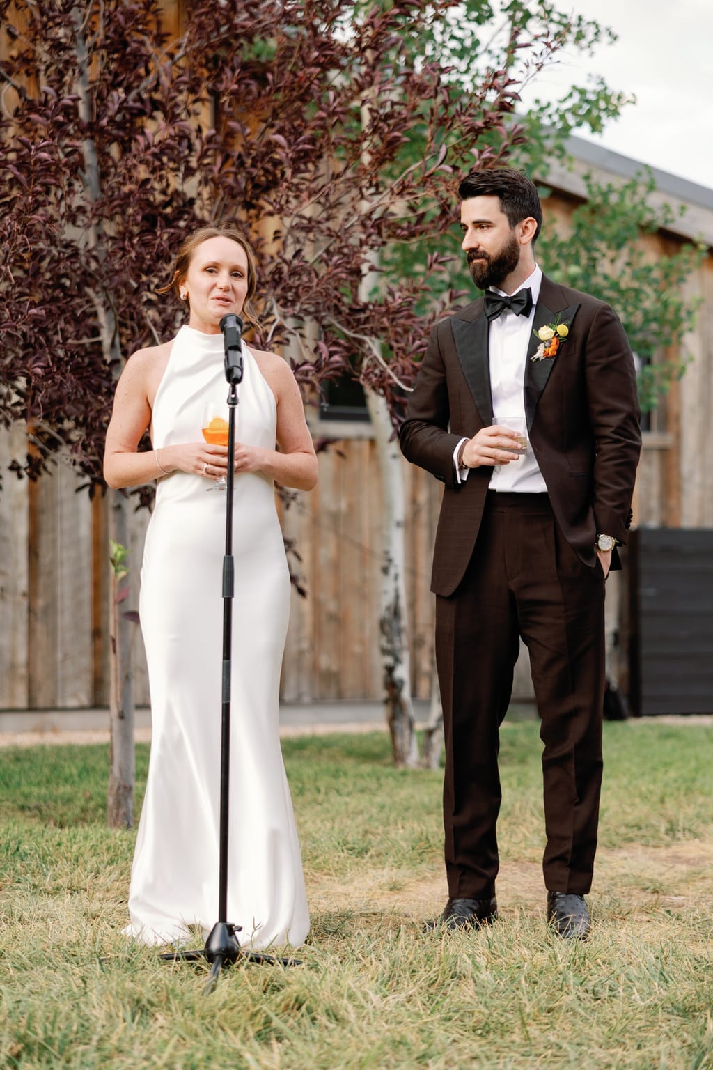 Bride and groom share private vows by the barn, a 4U Ranch wedding in Park City, Utah