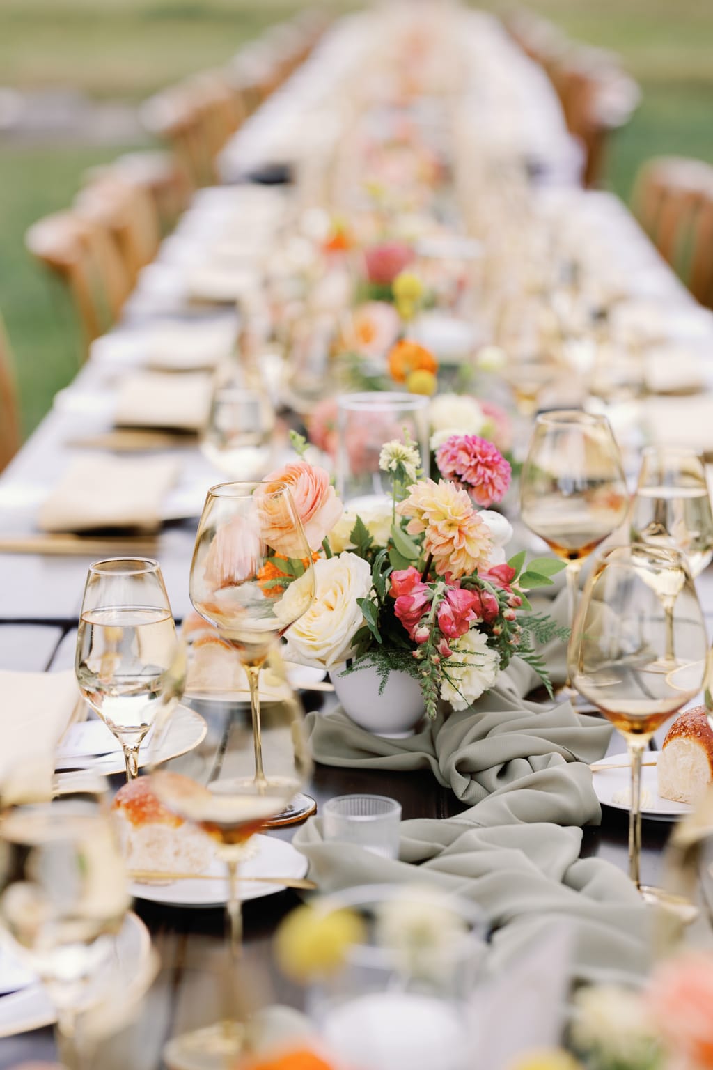 Reception tablescape with colorful florals at a 4U Ranch wedding in Park City, Utah