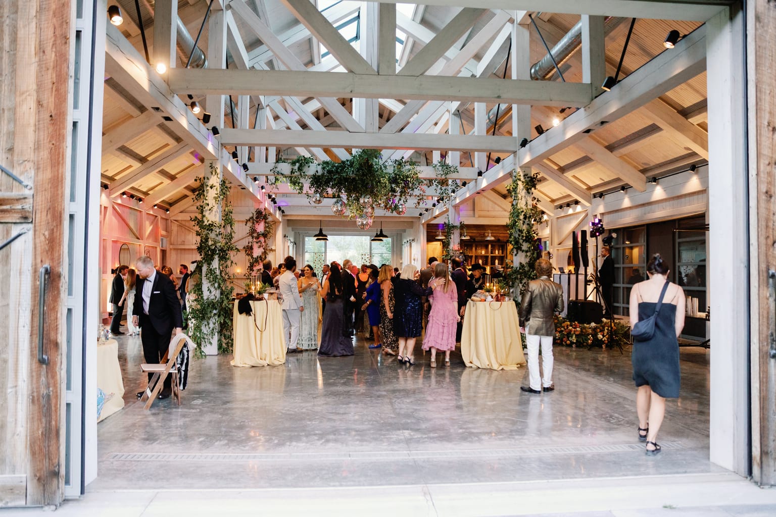 The string-lit barn set for the reception at a 4U Ranch wedding in Park City, Utah