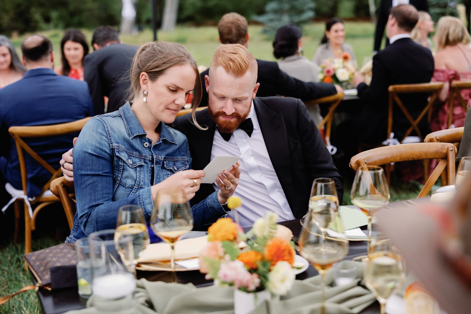 Guests at the long reception table during dinner, a 4U Ranch wedding in Park City, Utah