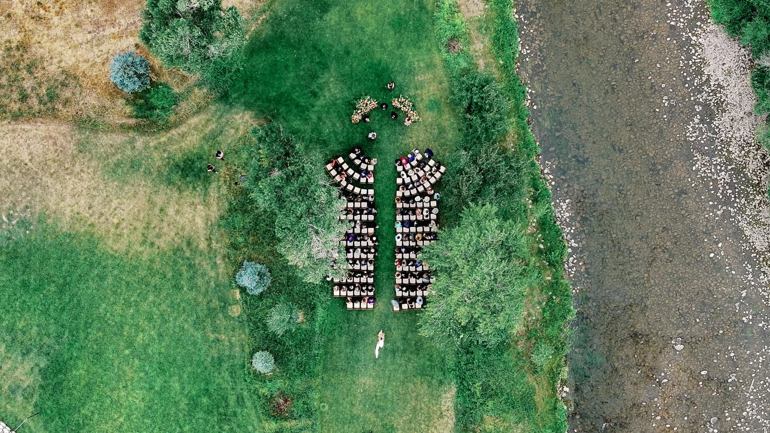 Aerial view of the outdoor ceremony in the meadow, a 4U Ranch wedding in Park City, Utah