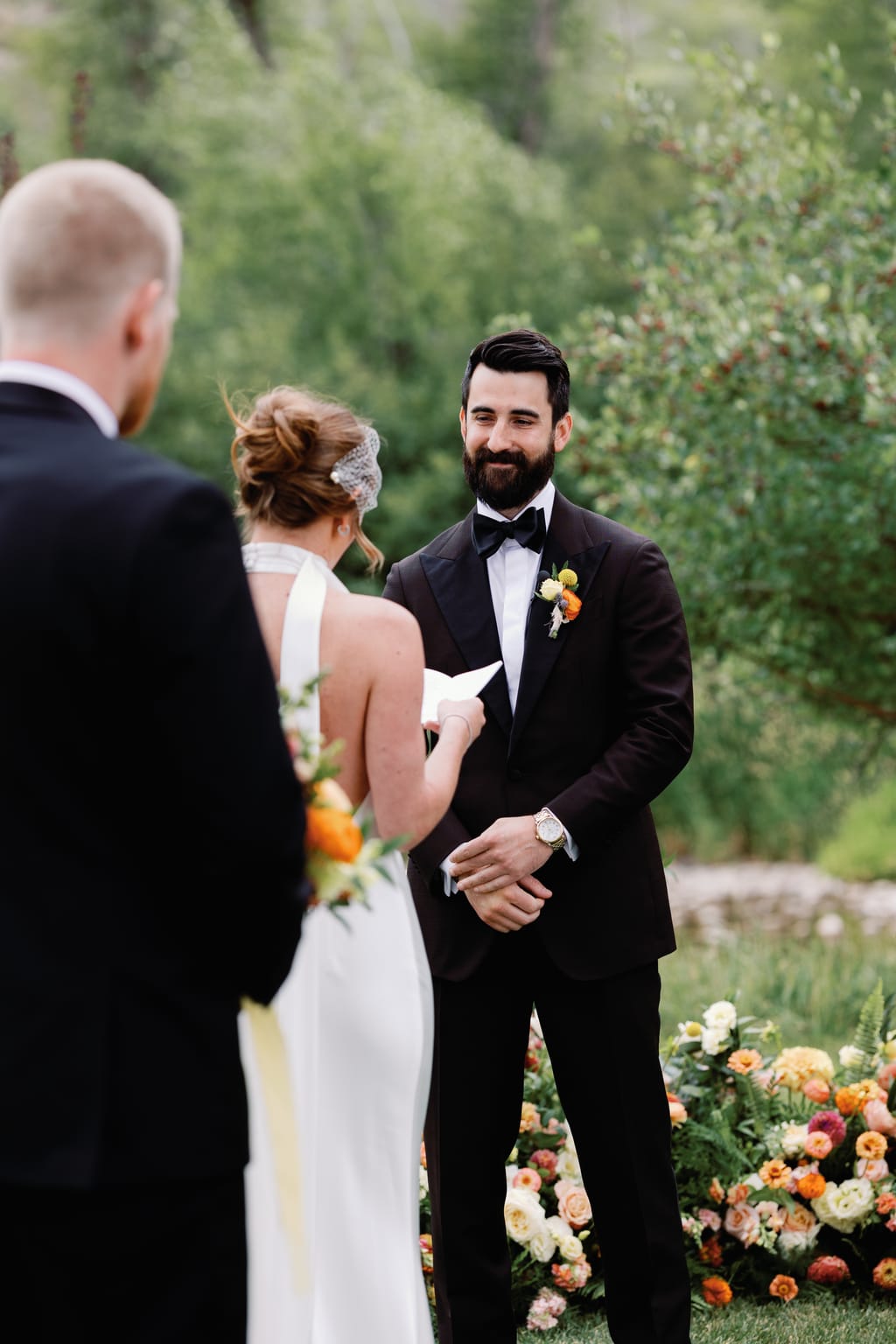 The first kiss at the outdoor ceremony, a 4U Ranch wedding in Park City, Utah