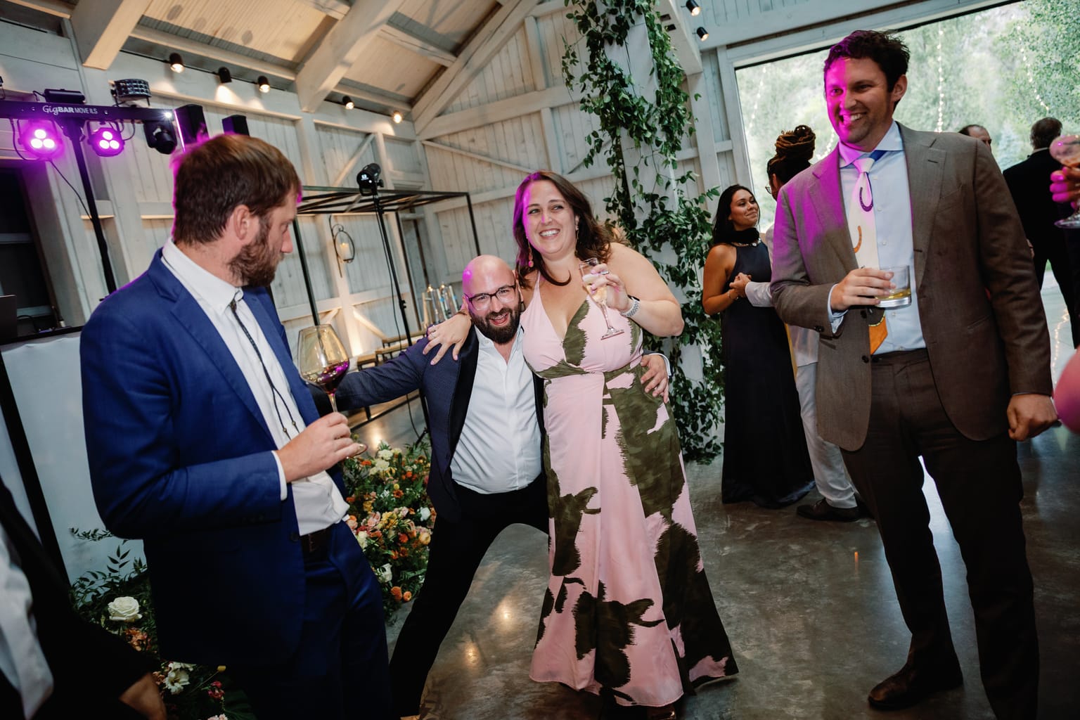 The couple celebrating on the dance floor at a 4U Ranch wedding reception in Park City, Utah